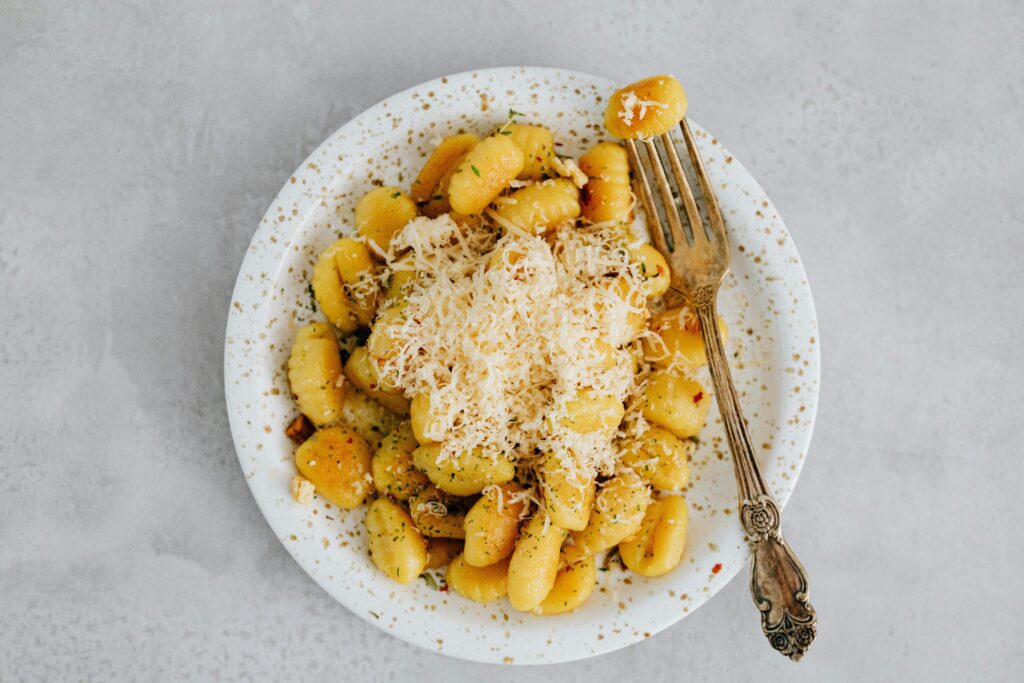 Tossing pasta in the pan with sauce the Italian way