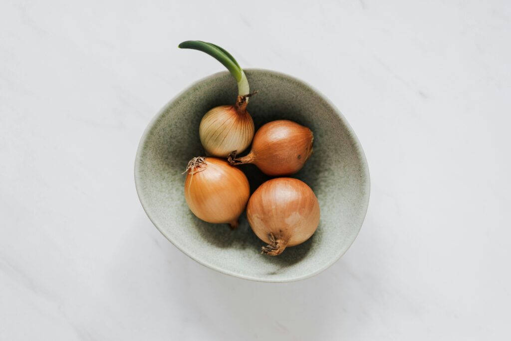 common onion cutting myths debunked including candles and bread on counter