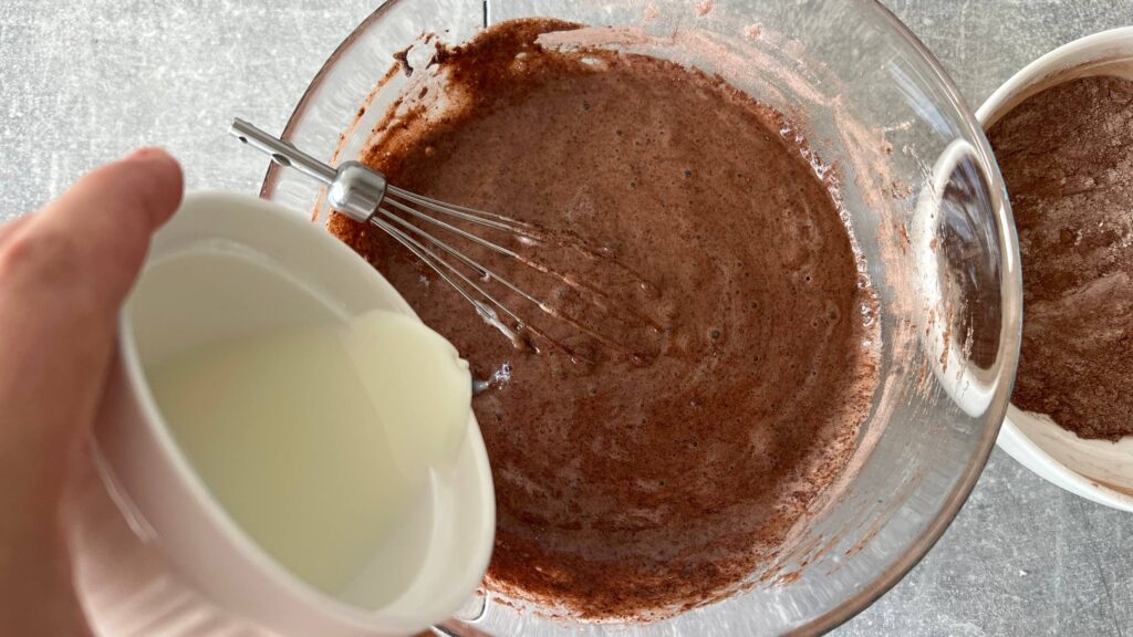 Stream in the milk, then the rest of the dry mix