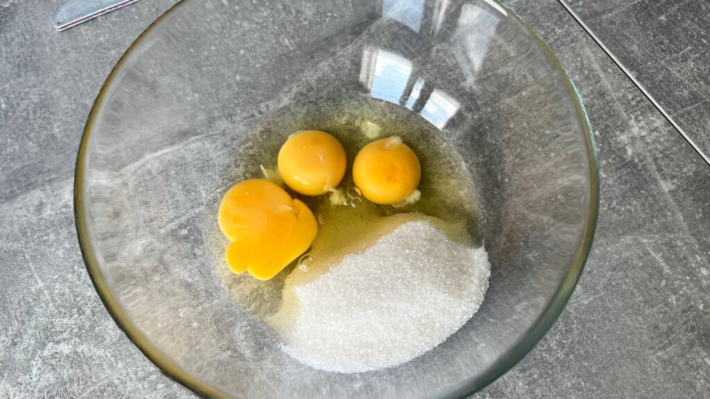 Whip the eggs, sugar and salt